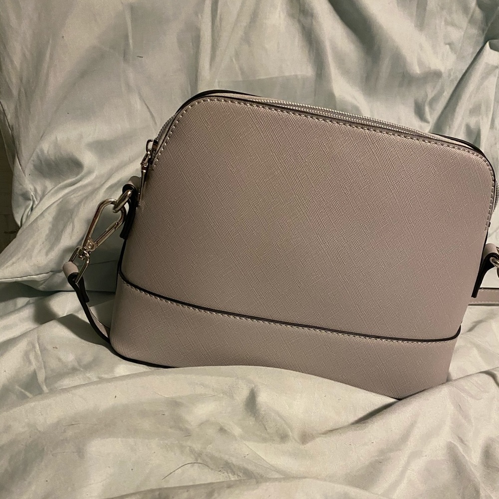 A Gray crossbody purse